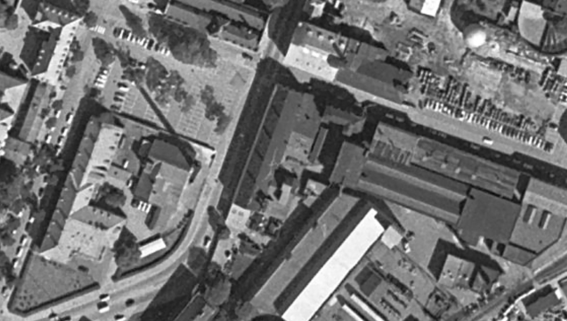 Aerial monochrome photograph of the industrial area that is the university campus today.