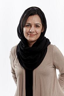 Head and shoulders portrait of Nadia Arshad. 