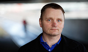 Porträttfoto av man