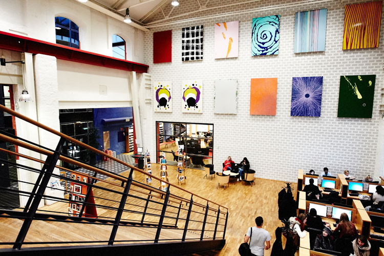 A suite of 12 paintings by Robert Lucander, adorns the southern wall of the library.