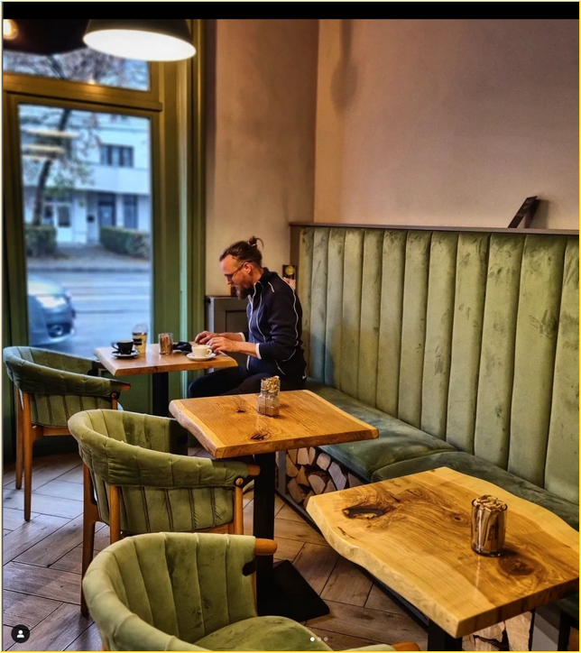 man sitting in a cafe