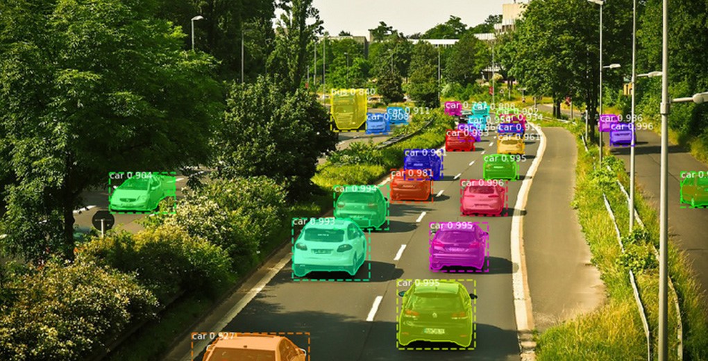 View of the algorithm detecting cars on the road using different colours