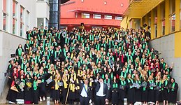 Image of graduated students in academic gown