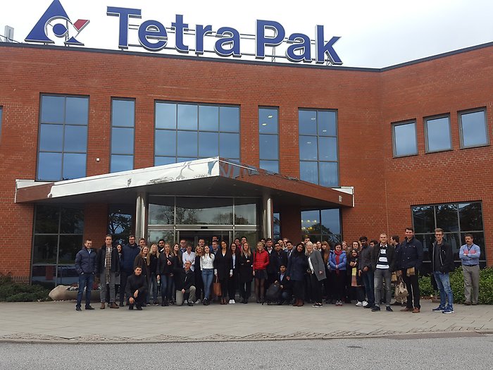 Group photo in front of Tetra pak